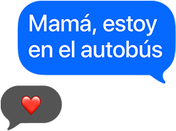 La función de mensajes del Apple Watch: en una burbuja azul se lee: Mamá, estoy en el autobús, y en la otra hay un emoji de corazón rojo