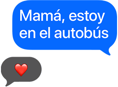 La función de mensajes del Apple Watch: en una burbuja azul se lee: Mamá, estoy en el autobús, y en la otra hay un emoji de corazón rojo