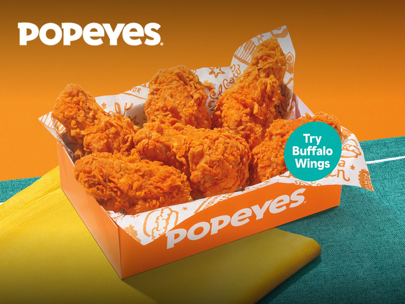 6 alitas de pollo en un balde de Popeyes​​​​​​​.