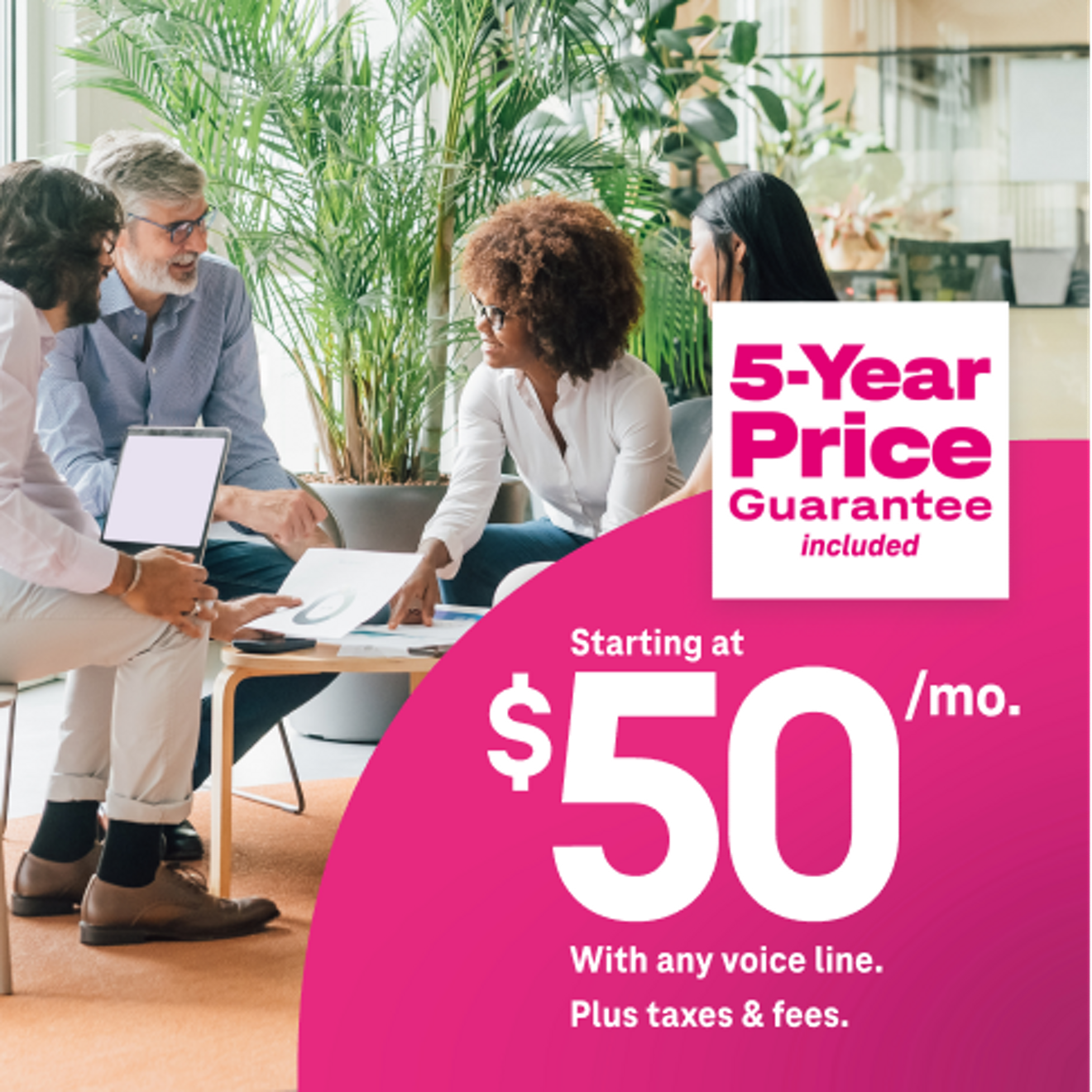 Four business people around table with computer