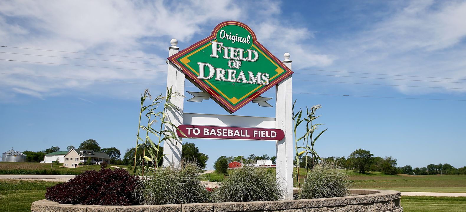 Sign that reads Original Field of Dreams to baseball field.
