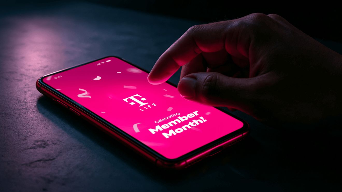 Hand accessing T-Mobile's app, T-Life.