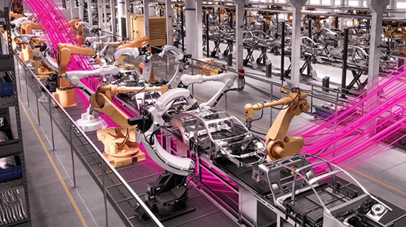 Línea de montaje de autos automatizada con rayos de luz magenta que la atraviesan.