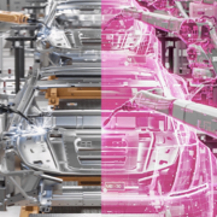 Una línea de brazos robóticos trabajando en autos en una fábrica