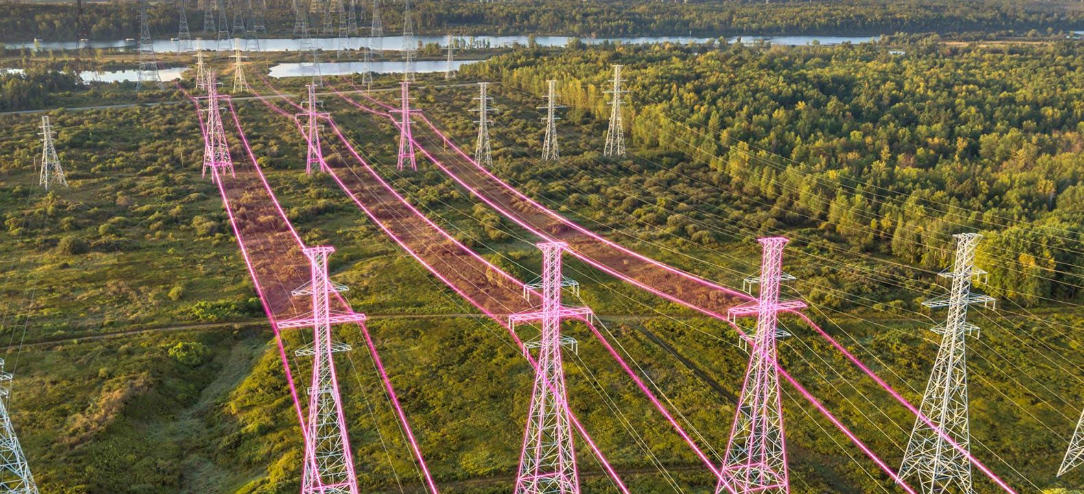 Una vista aérea de tendido eléctrico y torres de tendido eléctrico, la mayoría en color magenta.
