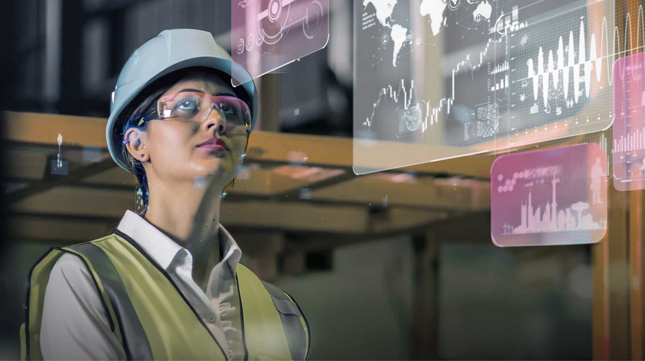 Un profesional de gestión logística utiliza gafas de realidad aumentada para revisar datos de transporte.