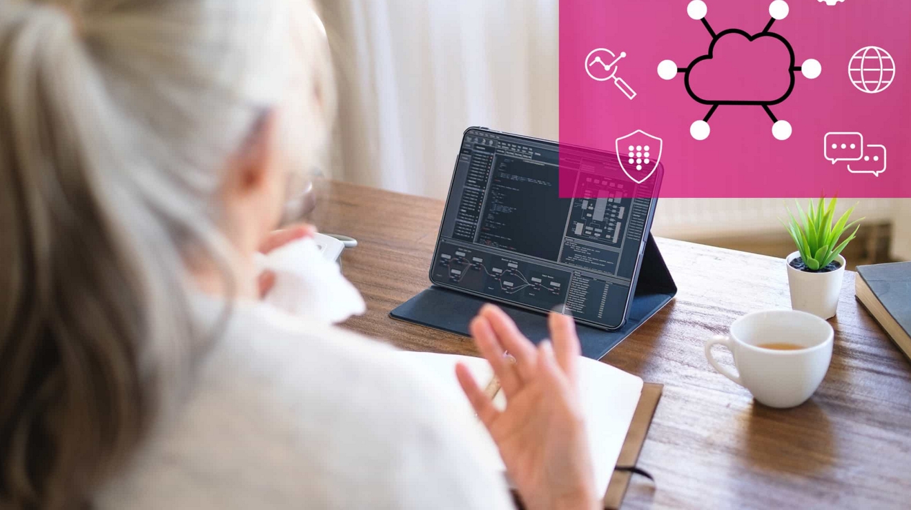 Una empleada productiva que trabaja a distancia utiliza su tablet para acceder de forma segura a Internet y a aplicaciones en la nube.