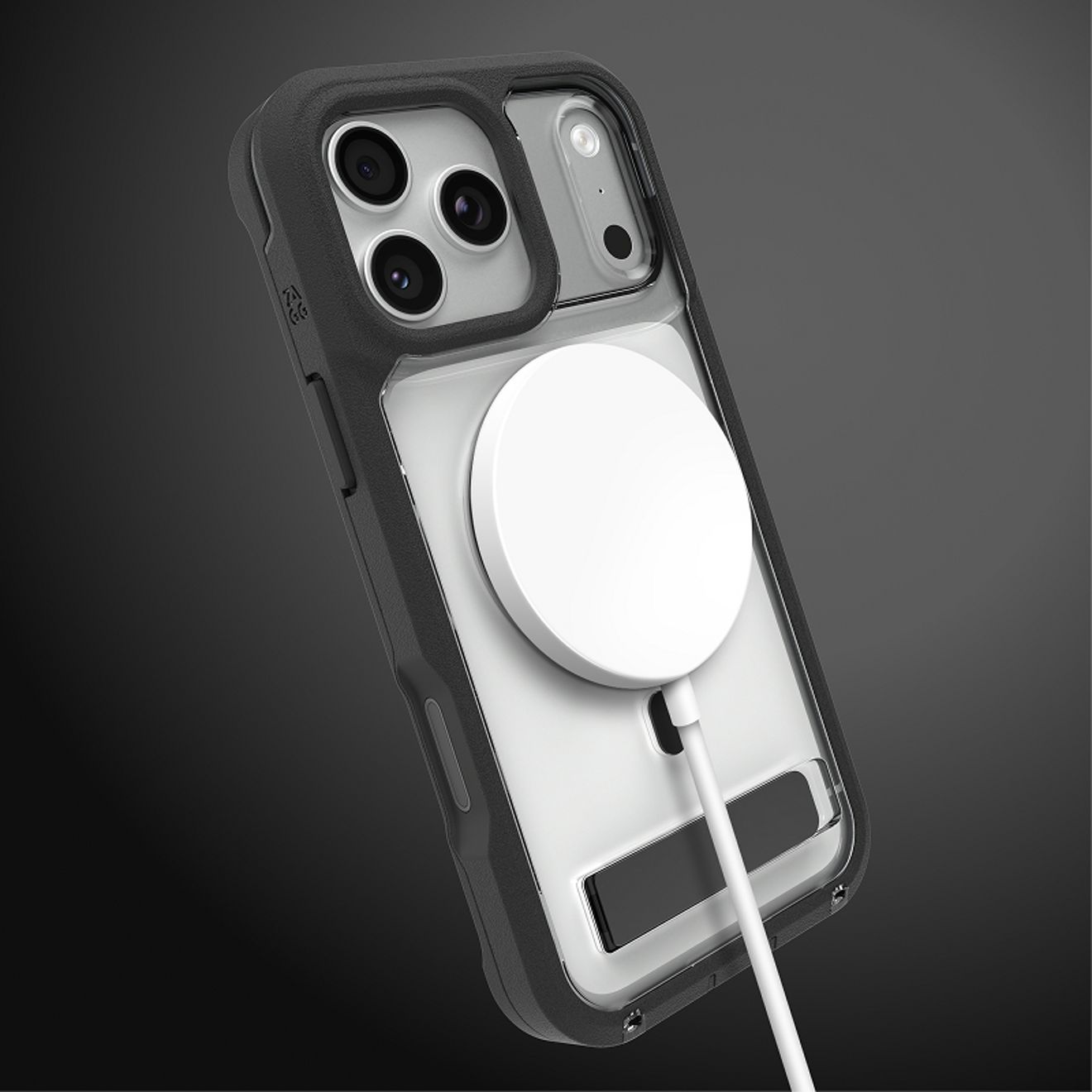 A silver iPhone 17 Pro in a clear ZAGG case with a built-in kickstand charges with a white MagSafe charger attached to the back.