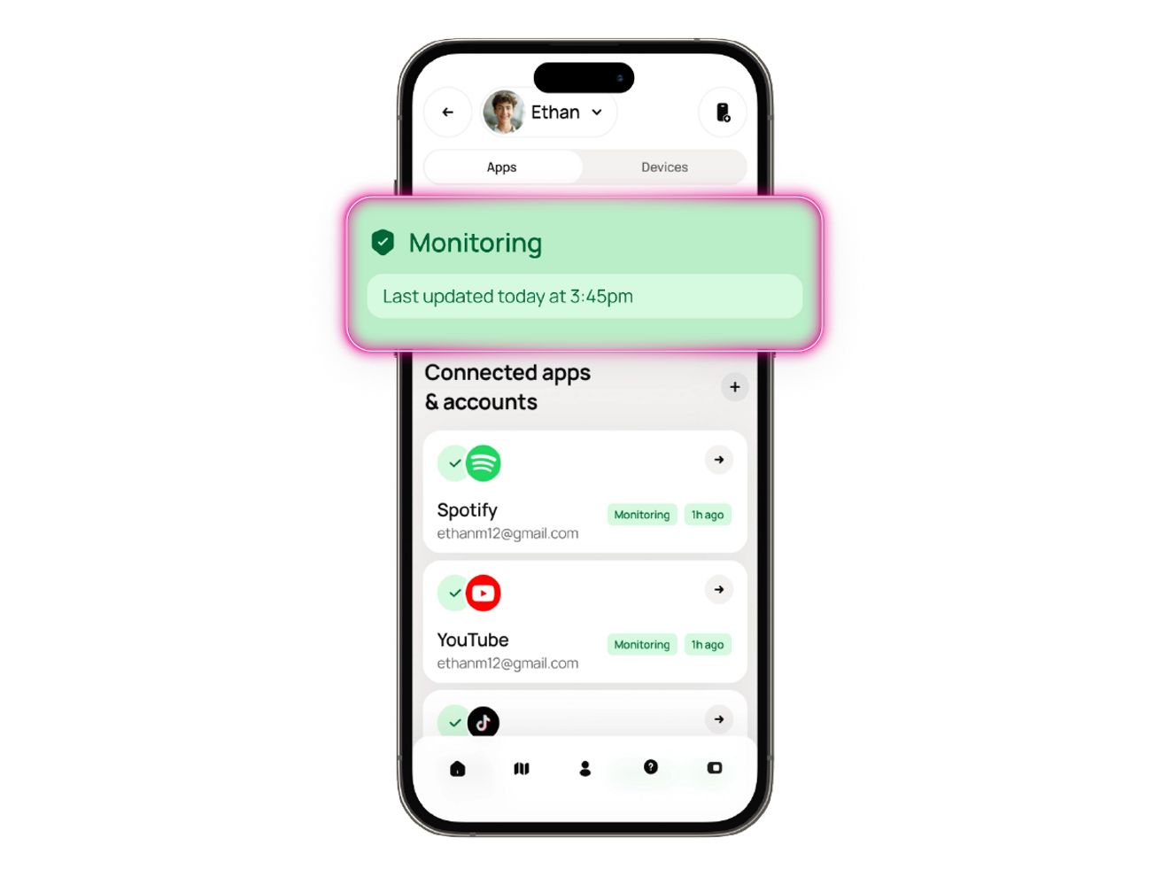 La pantalla del teléfono muestra una app de monitoreo con un haz circular de color magenta.
