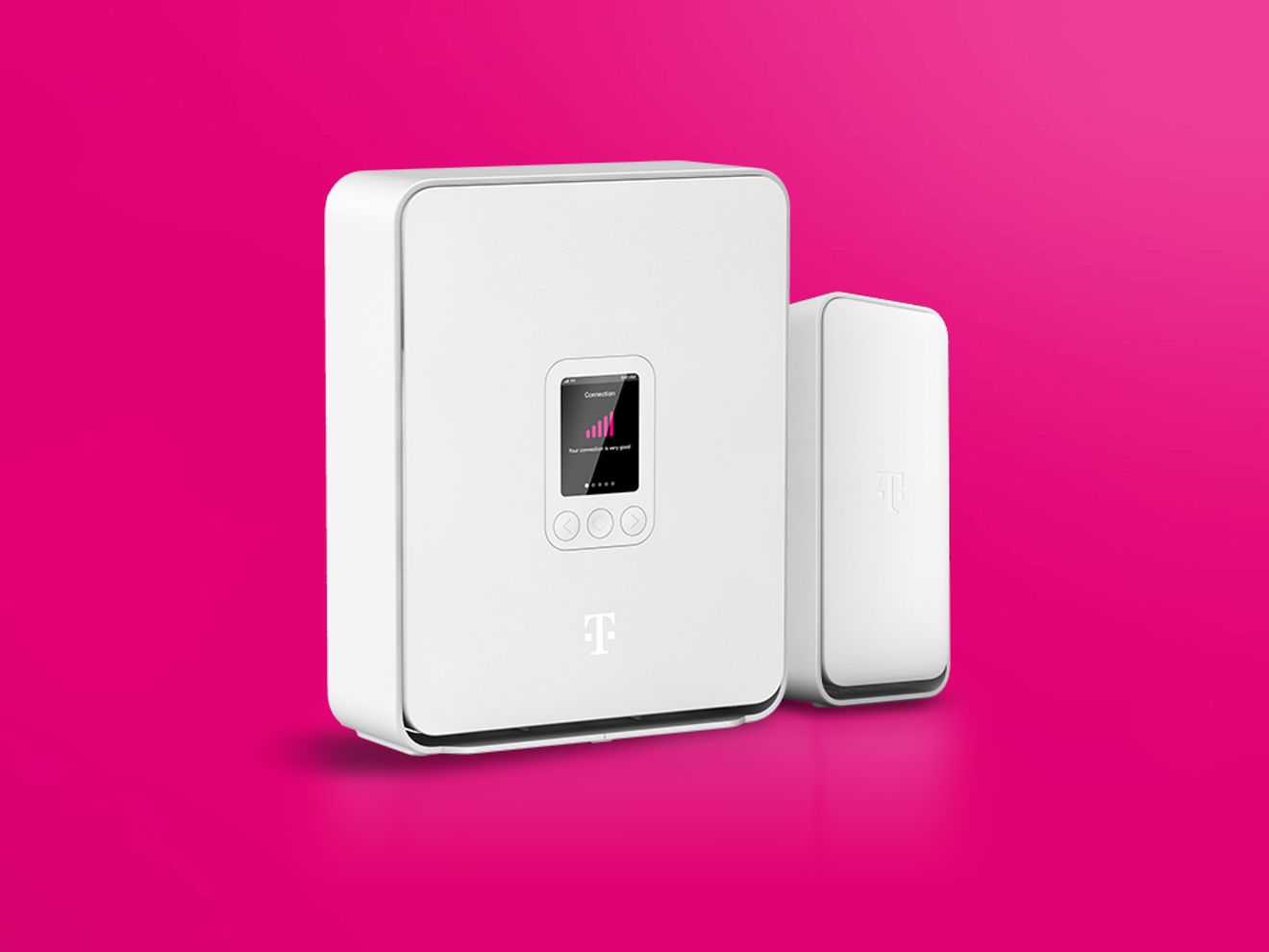 White T-Mobile home internet gateway device with a small display, shown against a bright pink background.