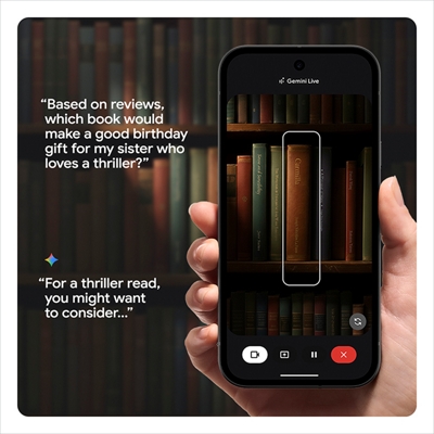 A Pixel 10a held up in front of a bookshelf, using Gemini Live to scan book spines and suggest a great thriller as a thoughtful gift
